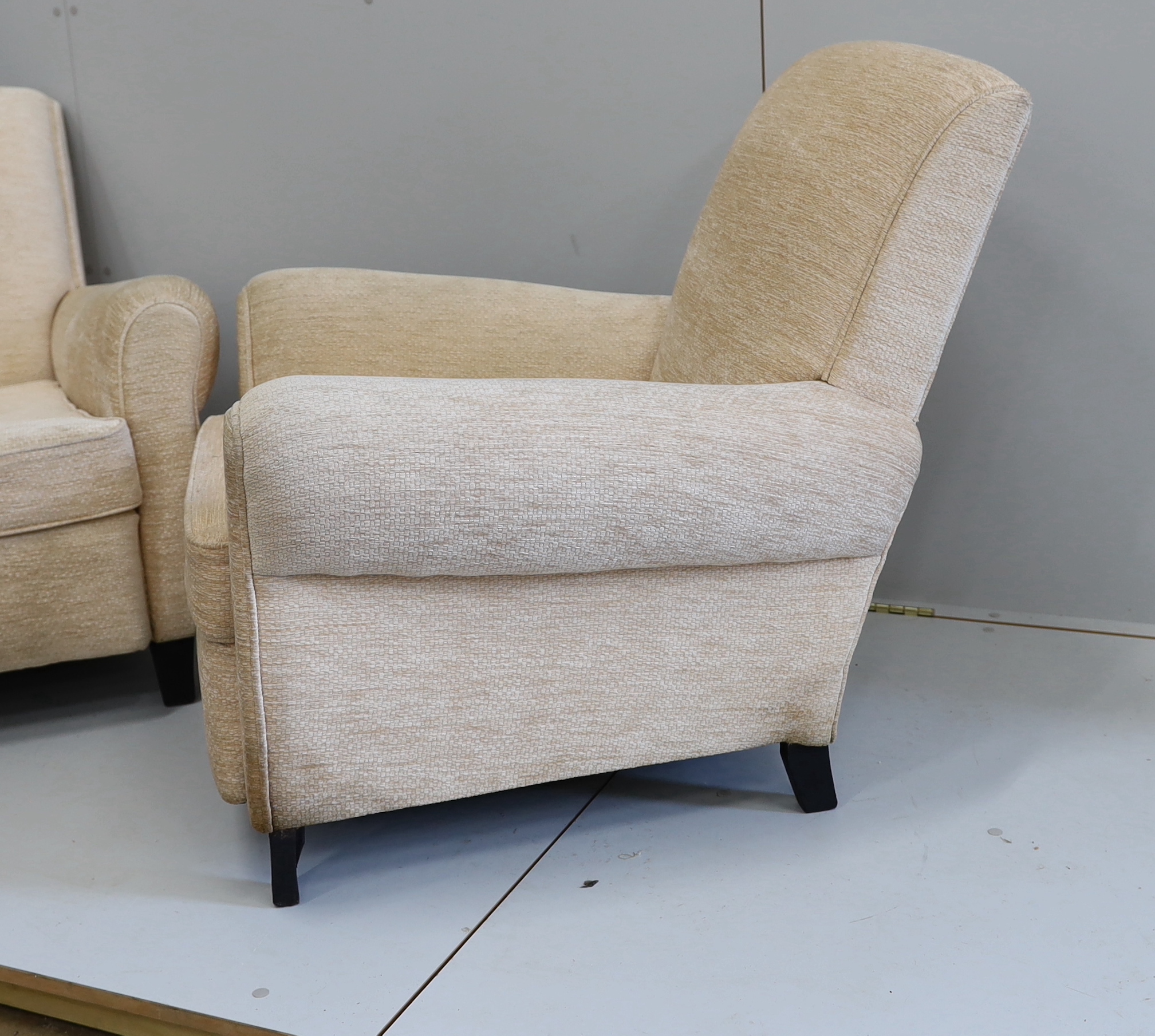 A pair of 1950's Italian armchairs in Bugatti style, width 84cm, depth 86cm, height 78cm